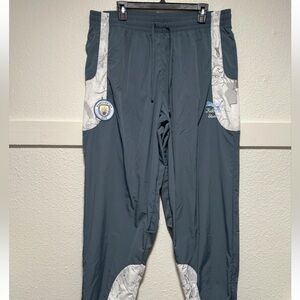 Men’s Puma Manchester City 2025 KidSuper Travel Pants Size XL New 606854-16